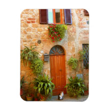 A cat seeks entrance to home in Pienza, Italy. Rectangular Magnets