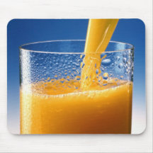 A Glass of Orange Juice Mousepads
