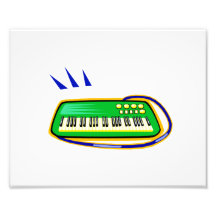 A green keytar with a blue strap graphic, art photo