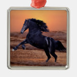 A sunset ocean horse ornament