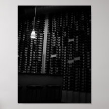 a wall of wine posters