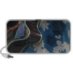 Acoustic Guitar Edge Against Blue Flower Dress Notebook Speaker