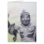 an oriental statue card