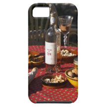 Aperitif and appetizers prepared: bread, olives, iPhone 5 covers