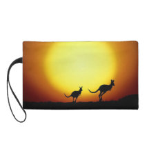 Australian Kangaroos Silhouetted Against A Sunset. Wristlet Clutches