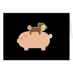 Baby Monkey Riding on a Pig Greeting Cards