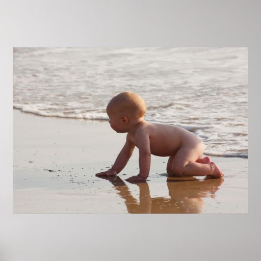 Baby playing in the sand on the beach print