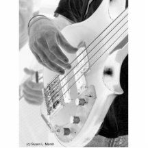 Bass player , bass and hand, negative image cut outs