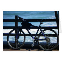 Bike at Sea Greeting Cards
