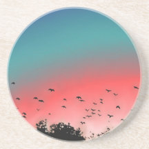 Birds flying high beverage coasters