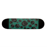 Black flowers on jade green. skateboard