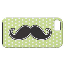 Black handlebar moustache on lime green polka dots