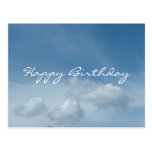 Blue sky and white clouds postcard.