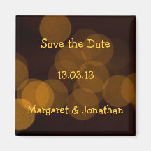 Blurry golden dots in black background Magnet