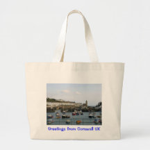 Boats in the village harbour bags