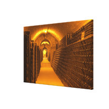 Bottles aging either in pupitres (racks) waiting stretched canvas print