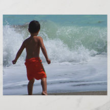 boy on beach playing in water flyer