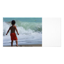 boy on beach playing in water photo card template