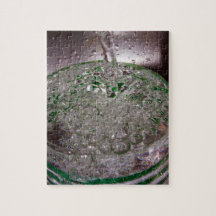 Carbonated Liquid Poured into a Cup Puzzle