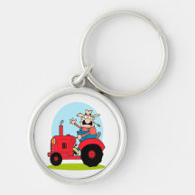 cartoon farmer riding a red tractor keychains