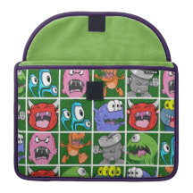 Cartoon Monsters on Green Background MacBook Pro Sleeves