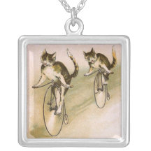 Cats on bikes pendant