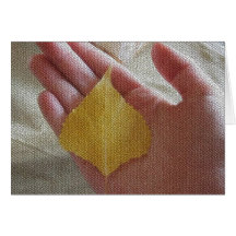 Childs hand with leaf greeting card