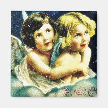 Christmas greeting with two angels huging fridge magnets