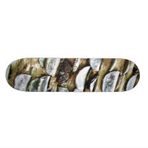 Coins Hammered Into A Trunk Skate Board Deck