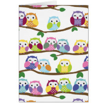 Colourful owls on a branch greeting card