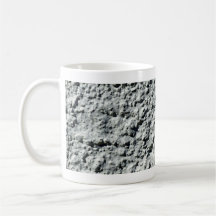 Concrete wall with rough surface coffee mugs