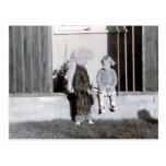 coonskin kid and girl postcard