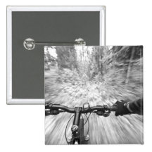 Cruising down a buff section of singletrack 2 pinback button