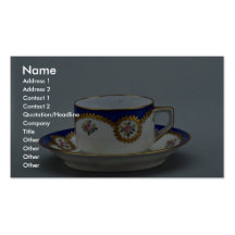 Cup and saucer with colourful designs business card