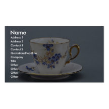 Cup and saucer with colourful flower designs business cards