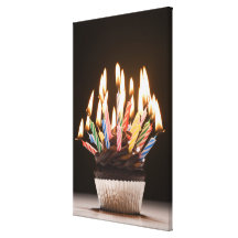 Cupcake with birthday candles canvas prints