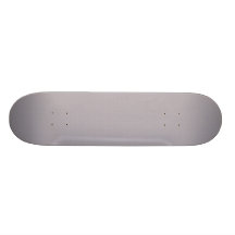 Cute tiny light grey lollypop gum on rough grey ba skateboard