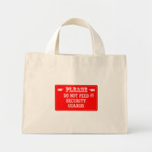 Do Not Feed The Security Guards Tote Bags