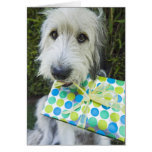 Dog with gift in mouth greeting cards