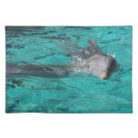 dolphin coming out of teal water full page placemat