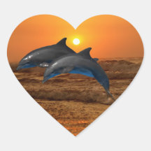 Dolphins at sunset heart stickers