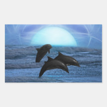 Dolphins playing at moonlight rectangular sticker