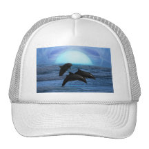 Dolphins playing at moonlight trucker hat