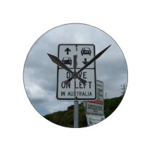 Drive On Left in Australia Sign Round Wallclocks