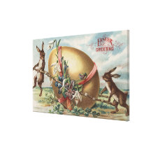 Easter GreetingsRabbits by a Decorated Egg Canvas Print