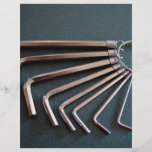 Eight hex/Allen keys arranged on table Flyer Design