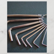 Eight hex/Allen keys arranged on table Flyer Design