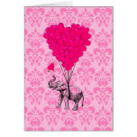 Elephant holding heart on pink damask card
