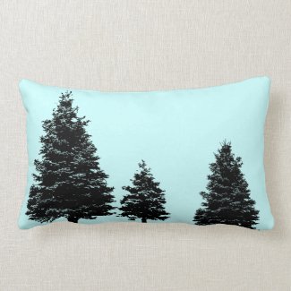 evergreen prints on blue pillow