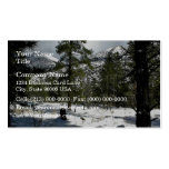 Evergreen trees in a snowy landscape business card template